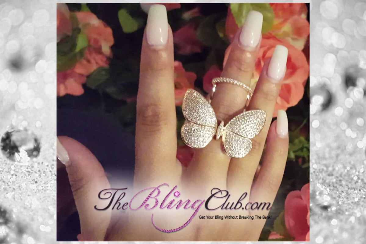 the bling club gold pave flying moving butterfly ring