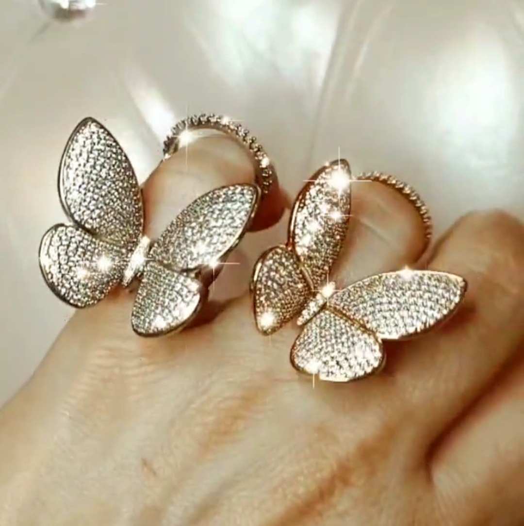 the bling club flying butterfly ring platinum rose gold