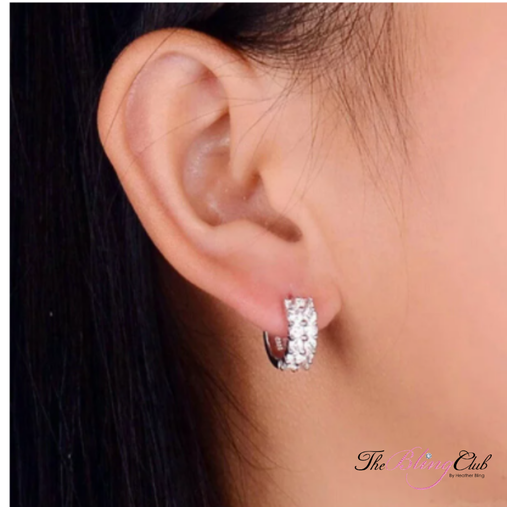 the bling club swarovski crystal dual row silver platinum plated huggies earrings on model